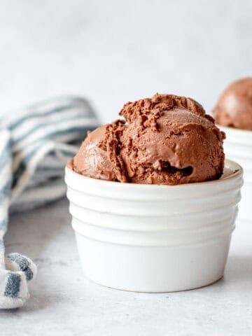 Chocolate Ice Cream in white ramekin.