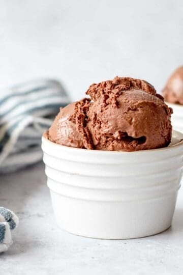 Chocolate Ice Cream in white ramekin.