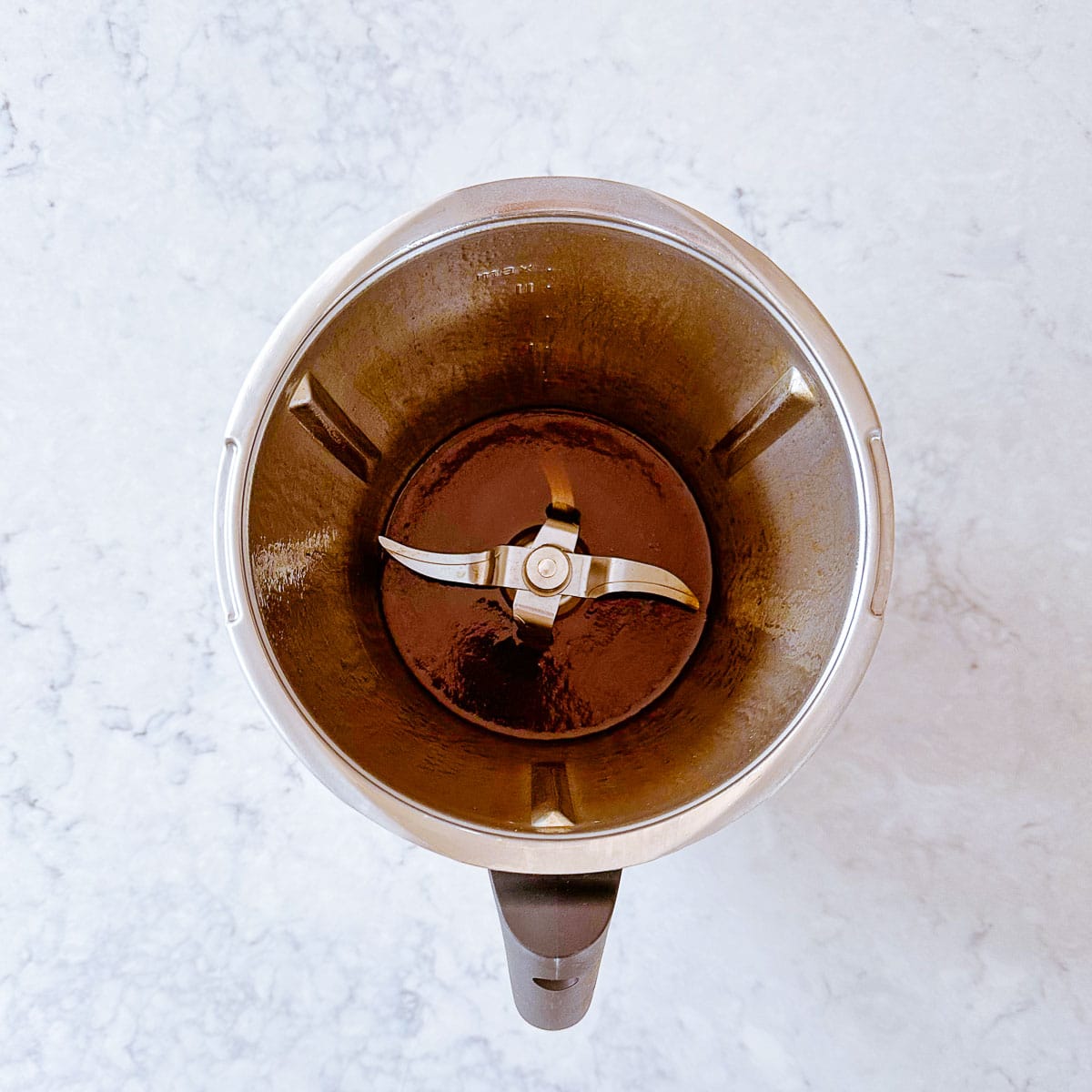 Melted Coconut Oil, Maple Syrup and Cinnamon in a Thermomix Bowl.