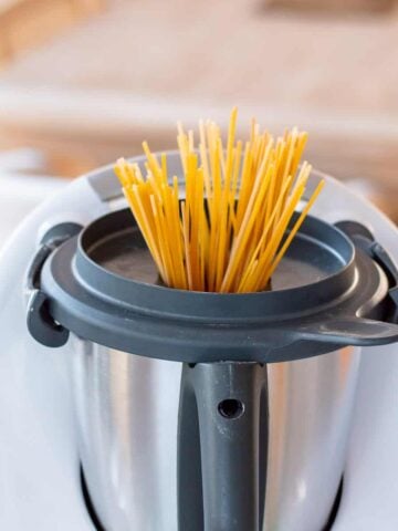 Spaghetti pasta being cooked in a Thermomix.