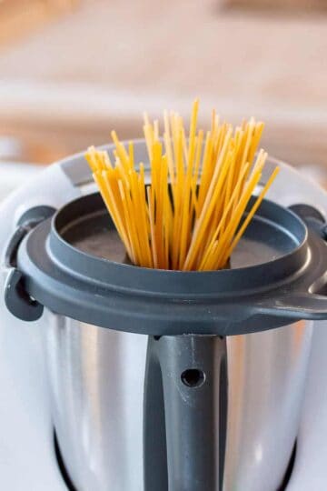 Spaghetti pasta being cooked in a Thermomix.