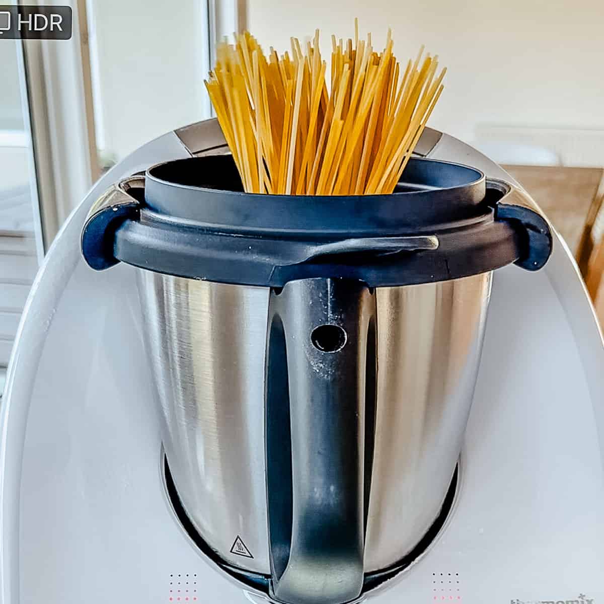 Thermomix with spaghetti in it.