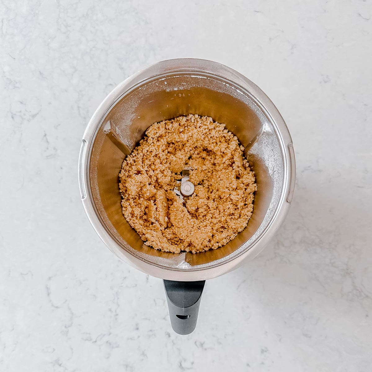 Crumble topping in a Thermomix bowl.