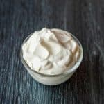 whipped cream in a glass bowl.