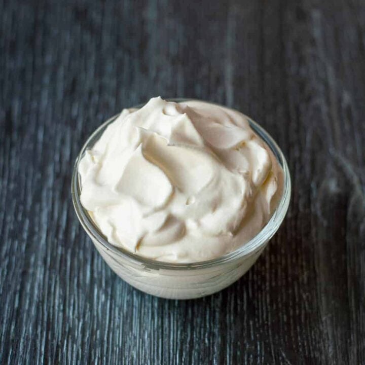 whipped cream in a glass bowl.