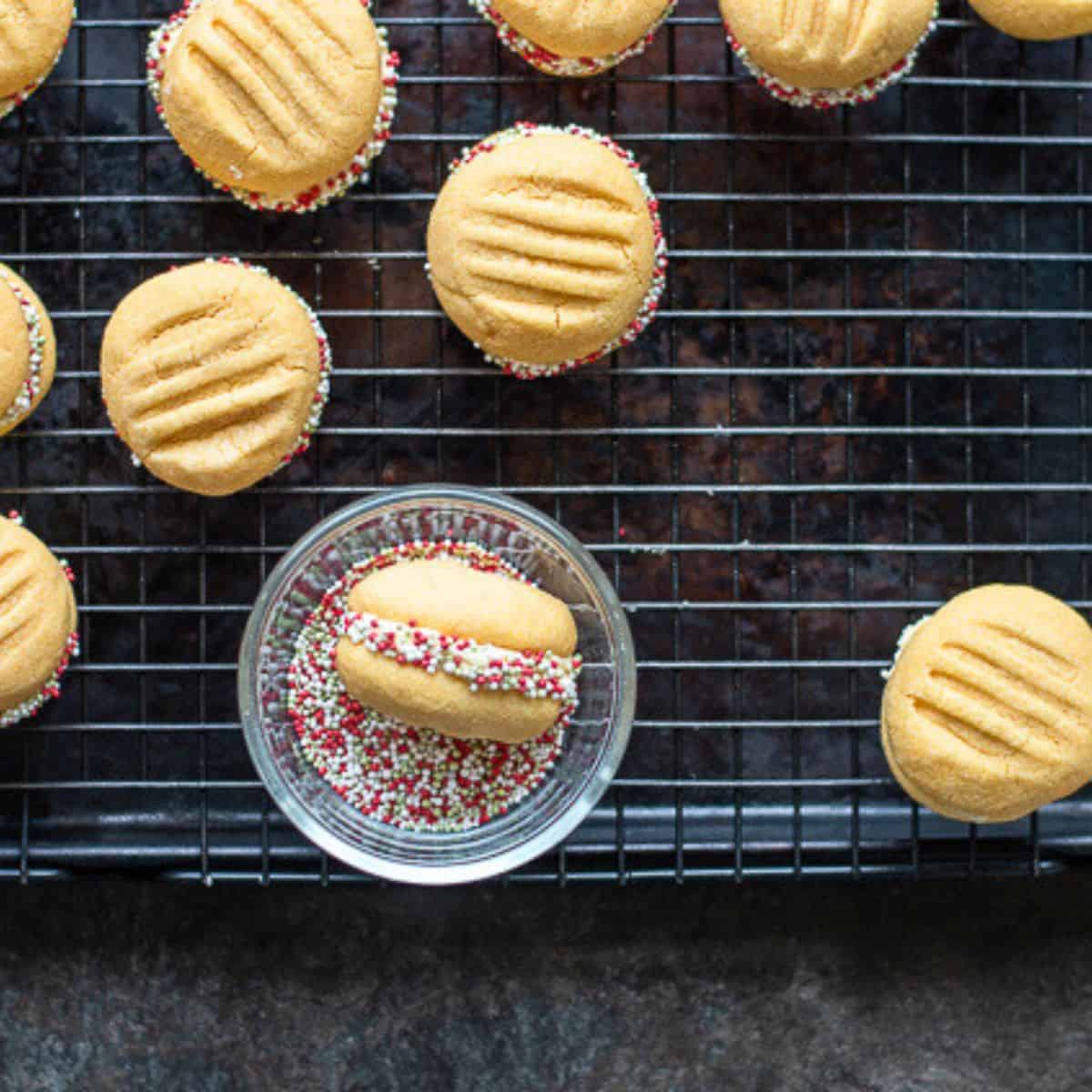 Melting moments dipped in sprinkles.