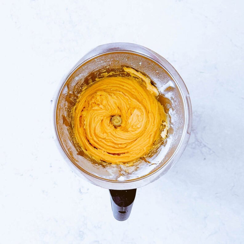 Cake batter in a mixing bowl.