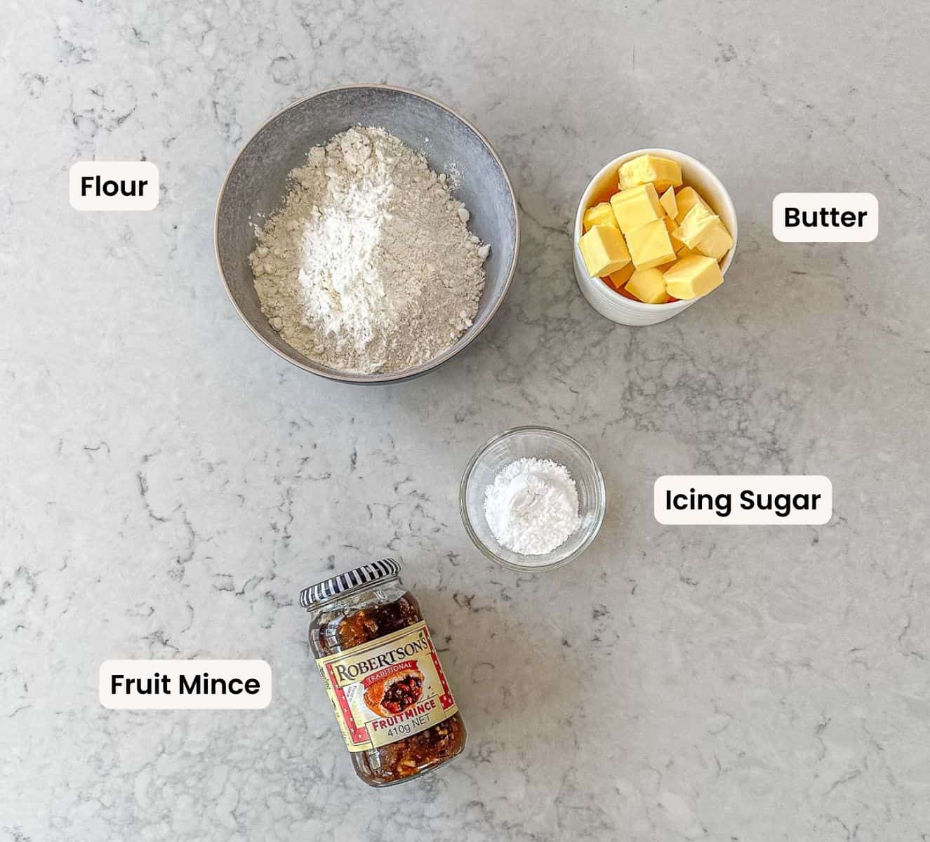 A collection of ingredients used to make Mince Pies.