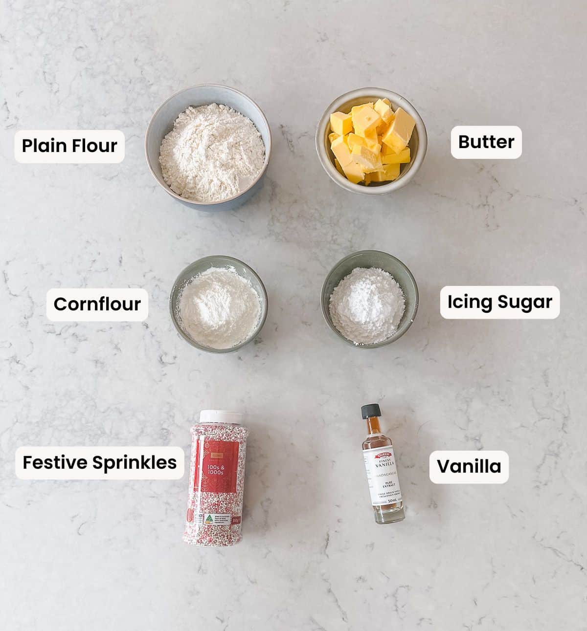A collection of labelled ingredients need to make festive melting moments.