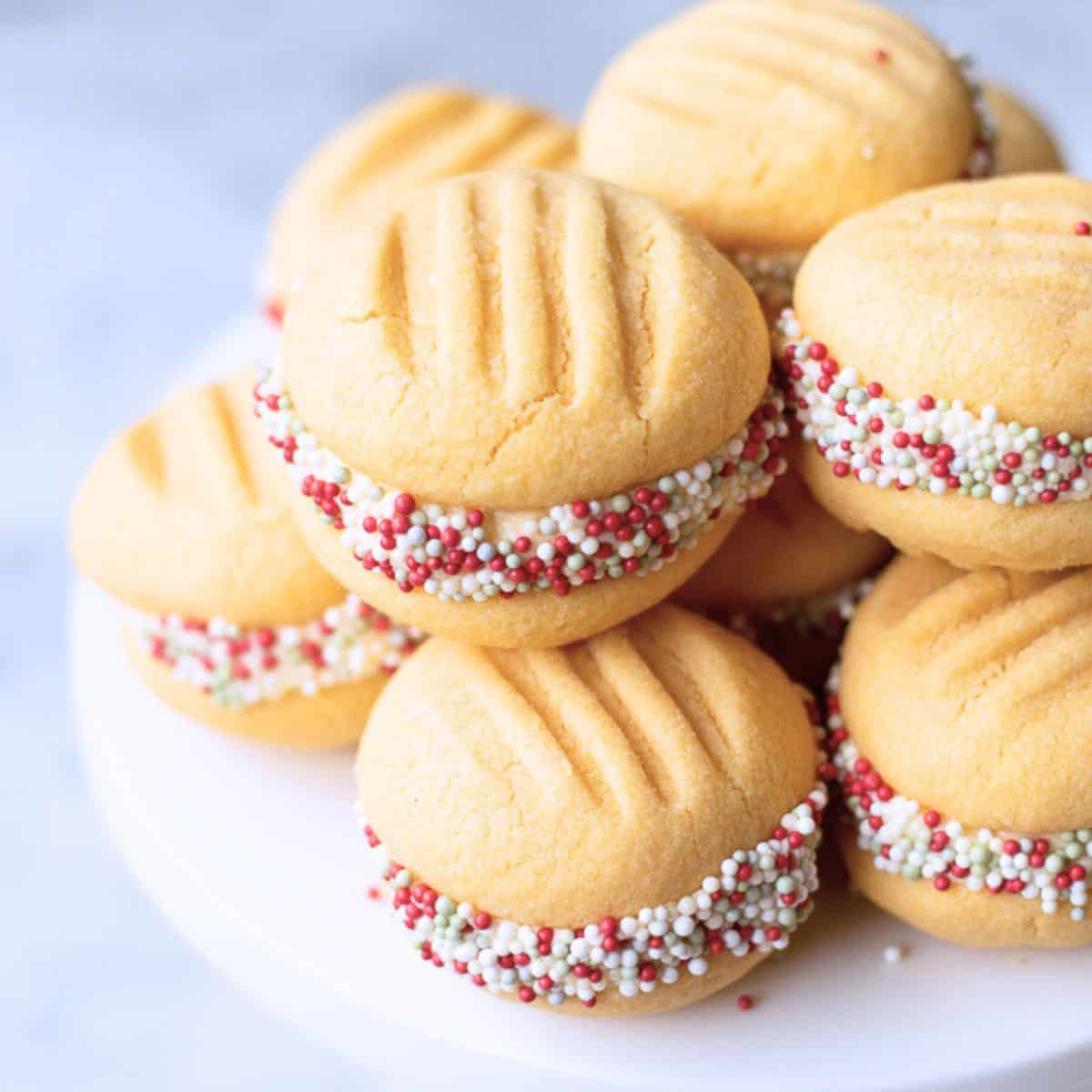 Melting moments dipped in Christmas Sprinkles.