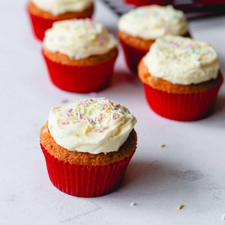 Cupcakes with buttercream icing and sprinkles.