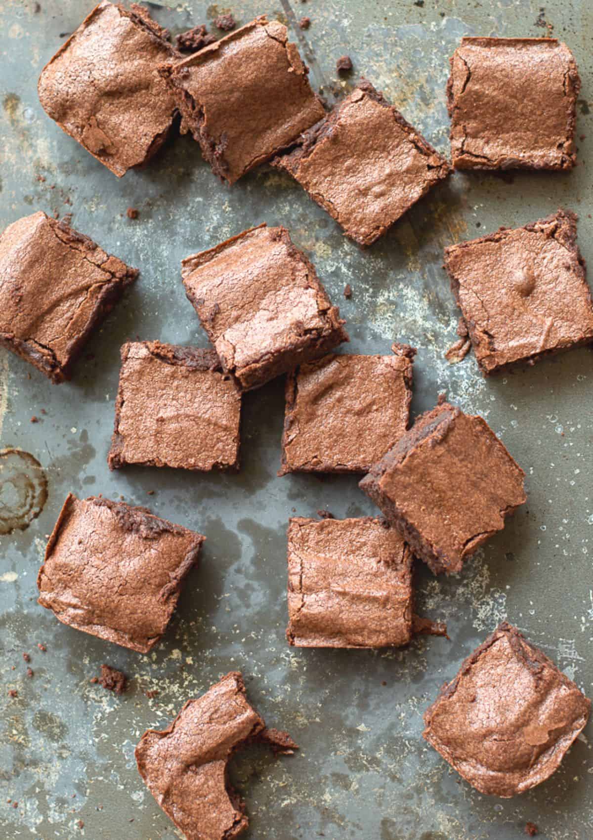 Overhead image of Chocolate Brownie Squares sitting on a baking tray.