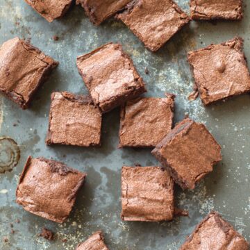 Chocolate Brownie squares on a baking tray.