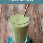 Green Smoothie in a glass with a gold straw