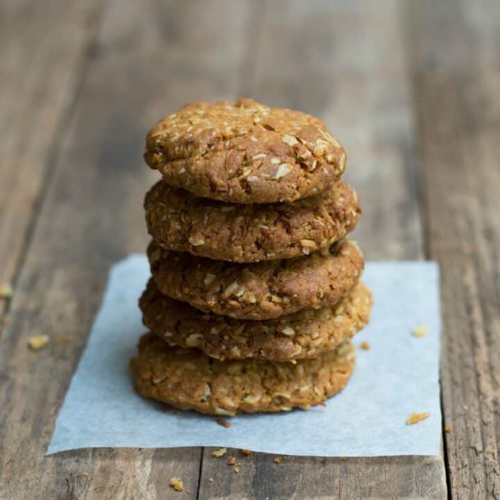 A stack of homemade Anzac Biscuits.