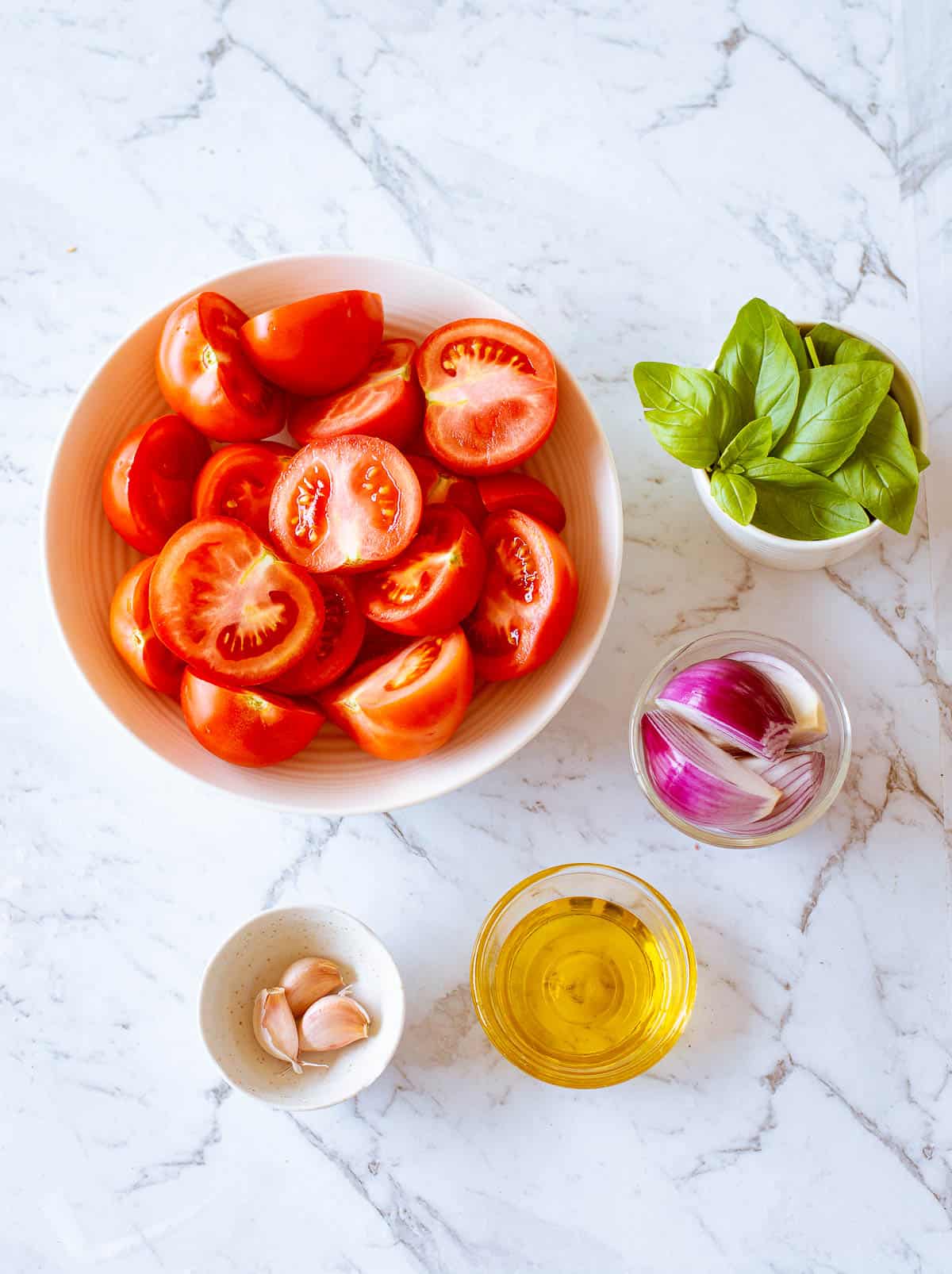 A collection of ingredients used to make Thermomix Tomato Soup.