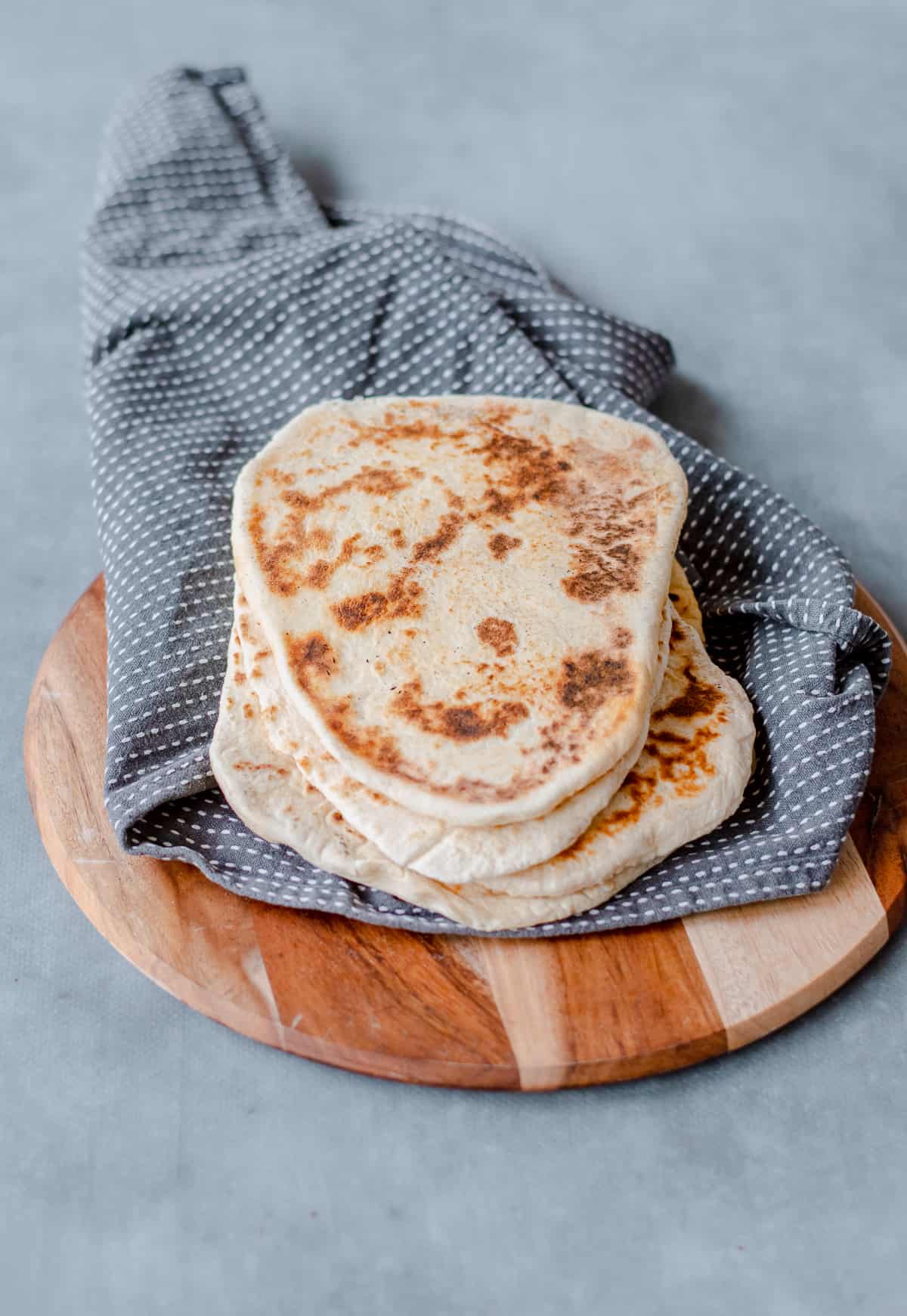 Homemade Naan Bread on a tea towel