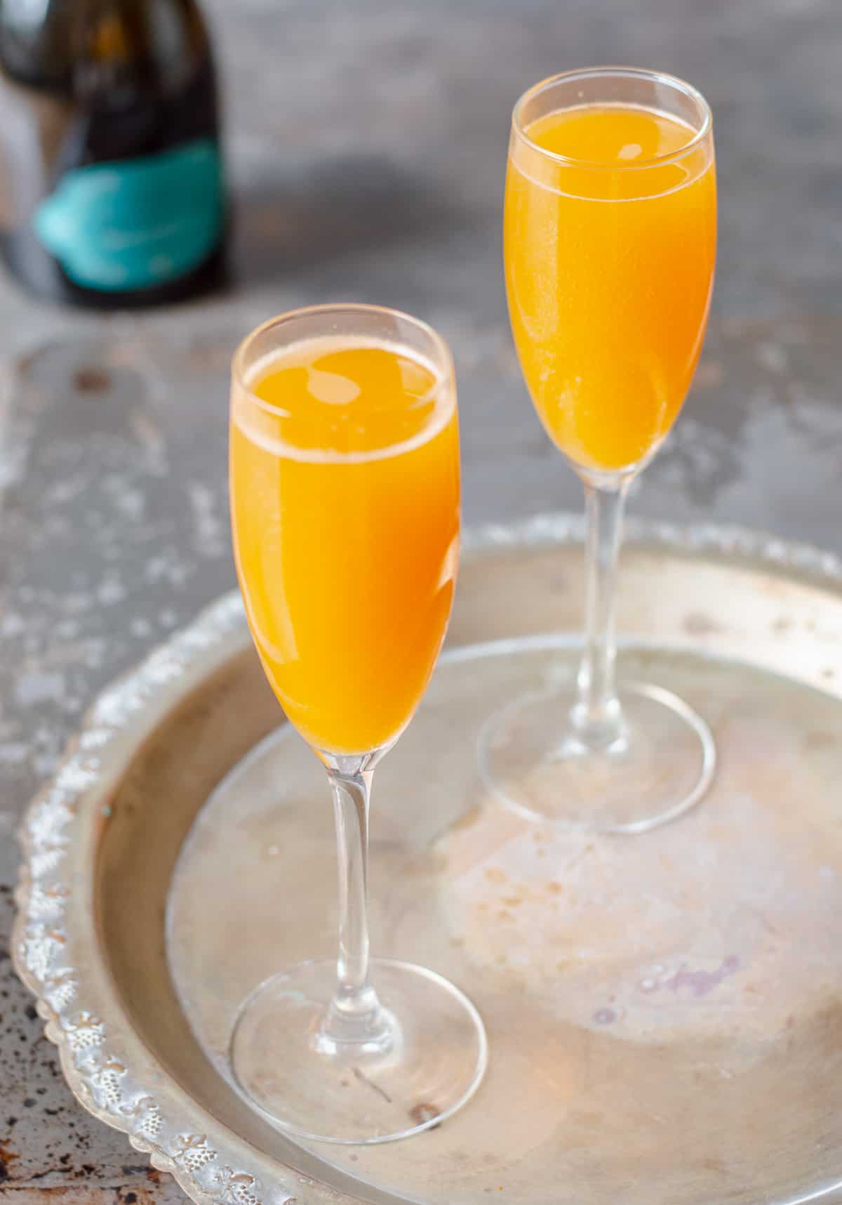 Peach Bellinis on a silver tray