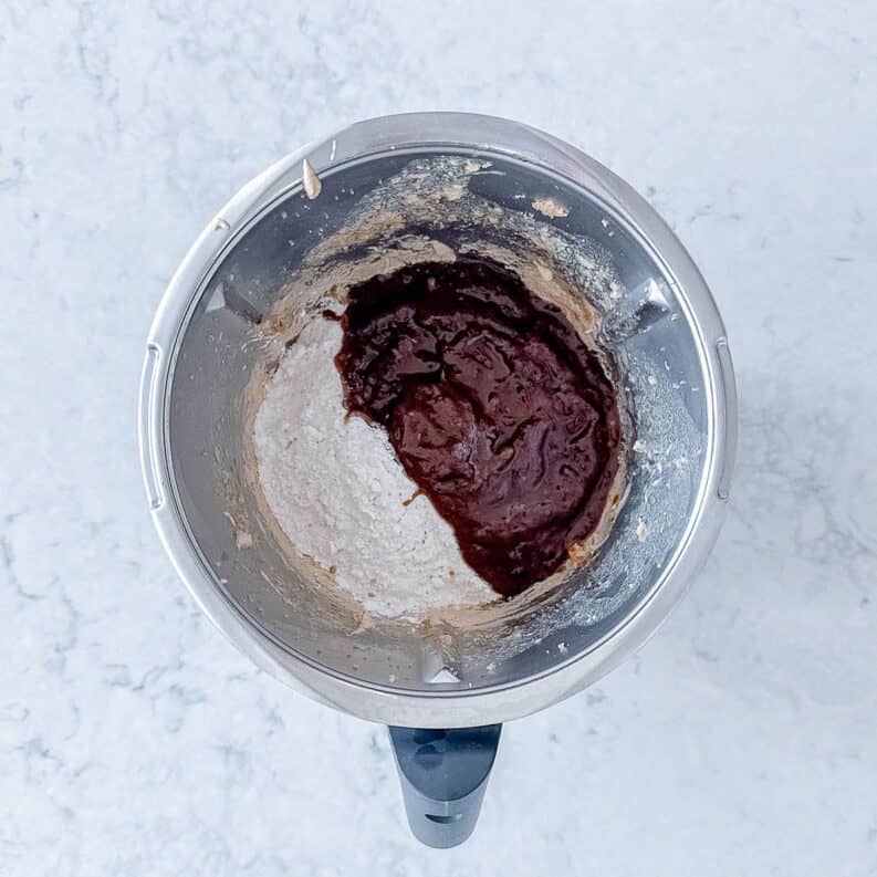 Sticky date mixture in a Thermomix bowl.