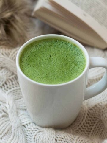 Hot Frothy Matcha Green Tea Latte in White Mug