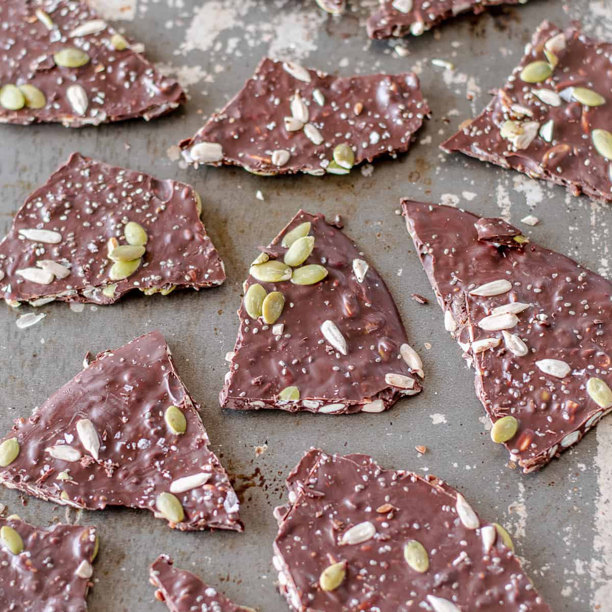 Dark chocolate bark covered in pumpkin, sunflower, flax and chia seeds.