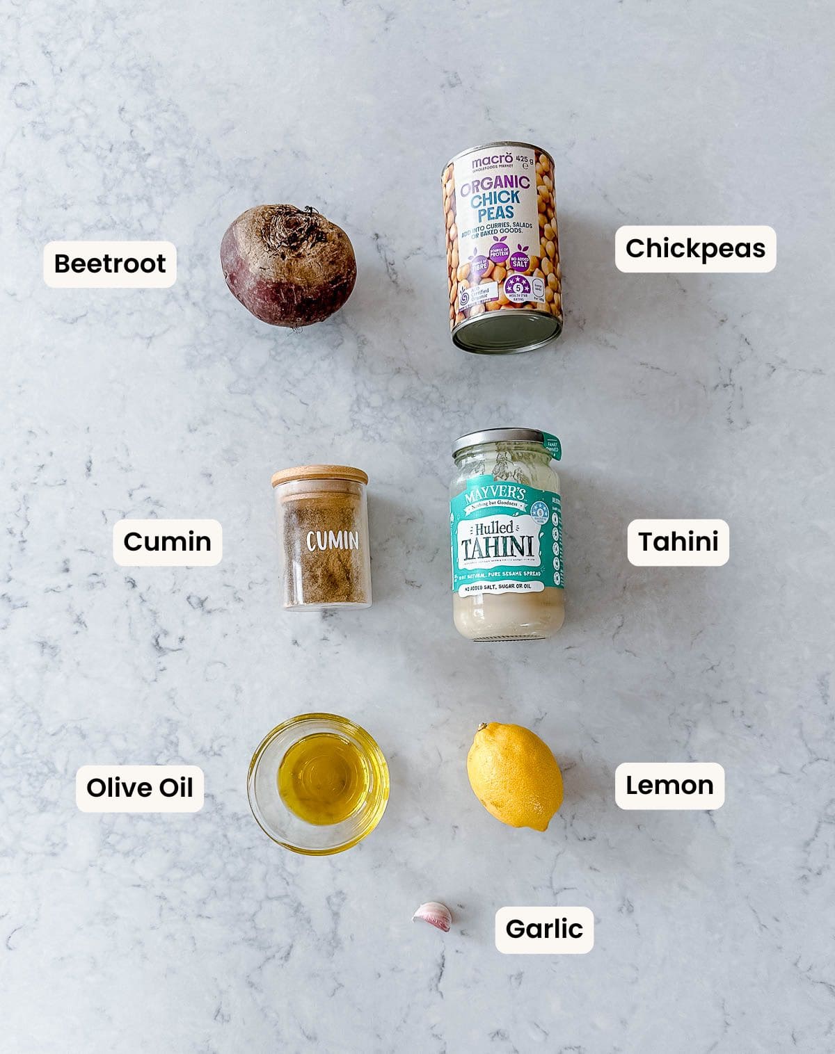 A collection of ingredients used to make a beetroot hummus.