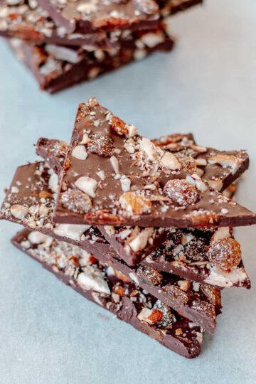 Dark chocolate bark with fruit and nuts cut into shards
