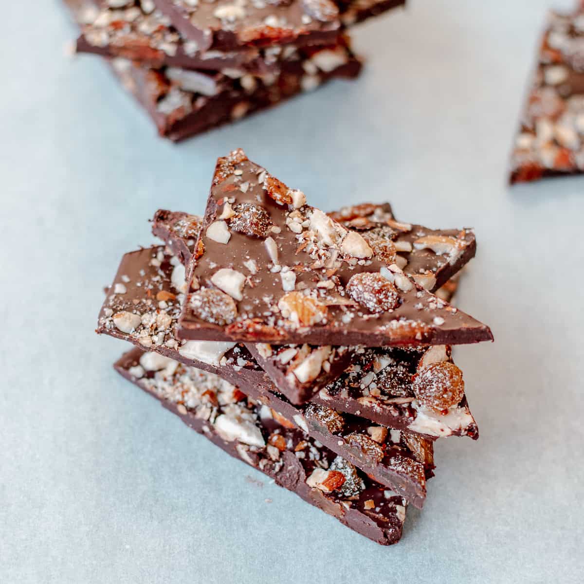 Dark chocolate bark with fruit and nuts cut into shards