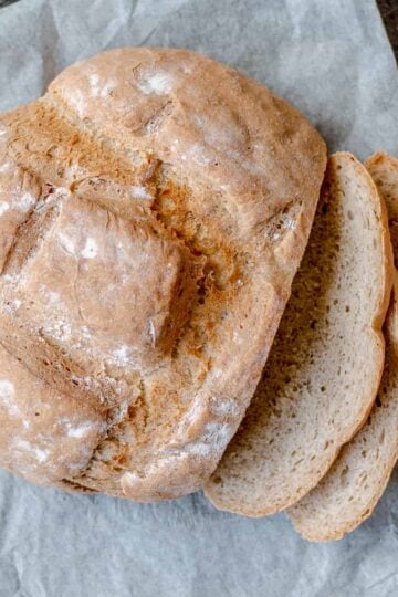 Sourdough bread on greaseproof paper sliced