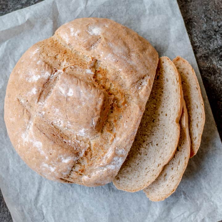 Sourdough bread on greaseproof paper sliced