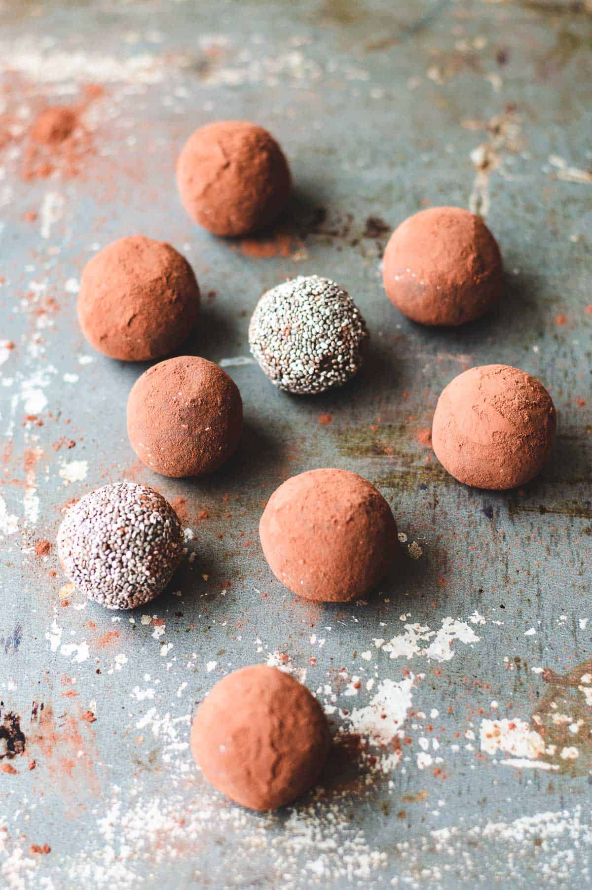 chocolate bliss balls on a baking tray.