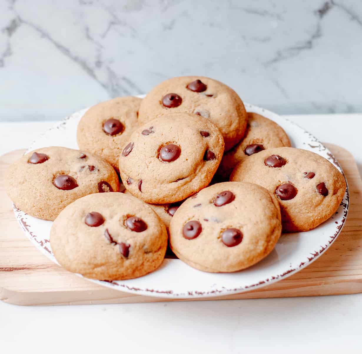 Chocolate chip cookies on a white plate