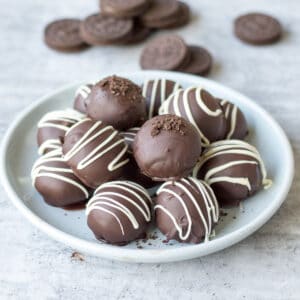 Homemade Oreo Balls on light blue plate