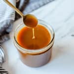 Caramel Sauce in a glass jar.