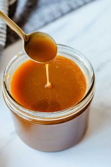 Caramel Sauce in a glass jar.