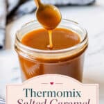 caramel sauce in a glass jar, drizzling from a spoon with text on the image reading thermomix salted caramel sauce.