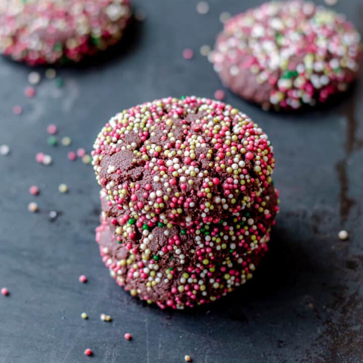 Christmas chocolate cookes covered in red, white and green spinkles