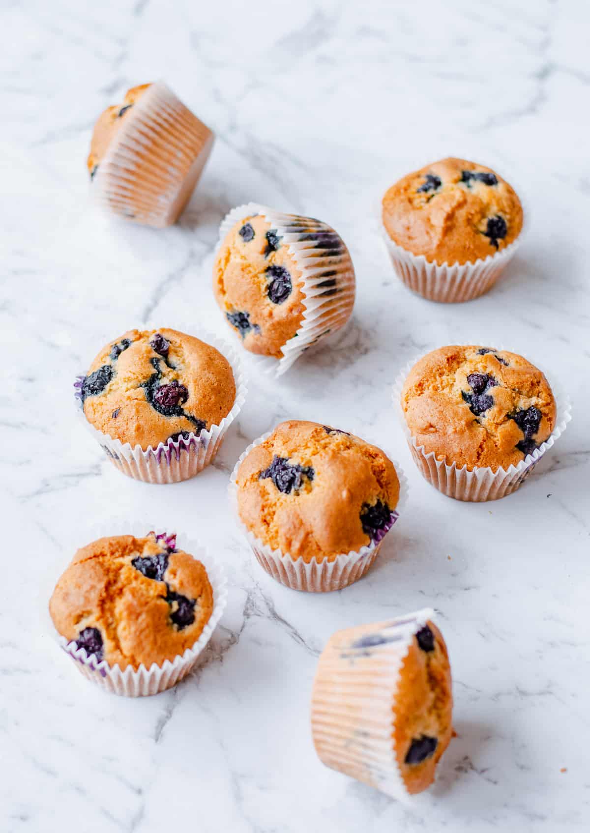 blueberry muffins on marble background
