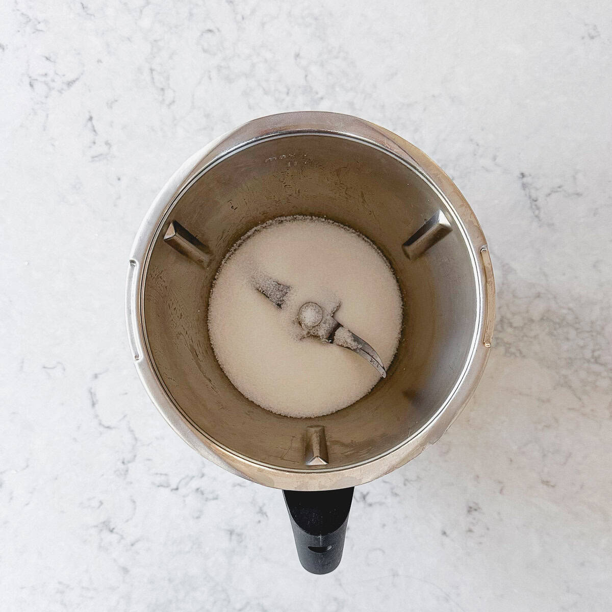white sugar in a thermomix bowl.