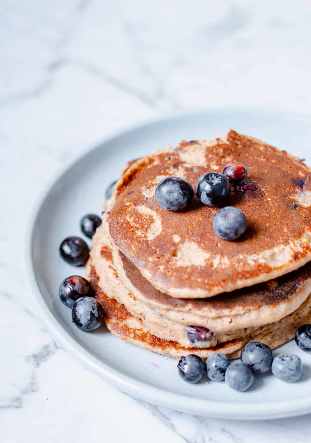 Pancakes with Blueberries on Blue Plate