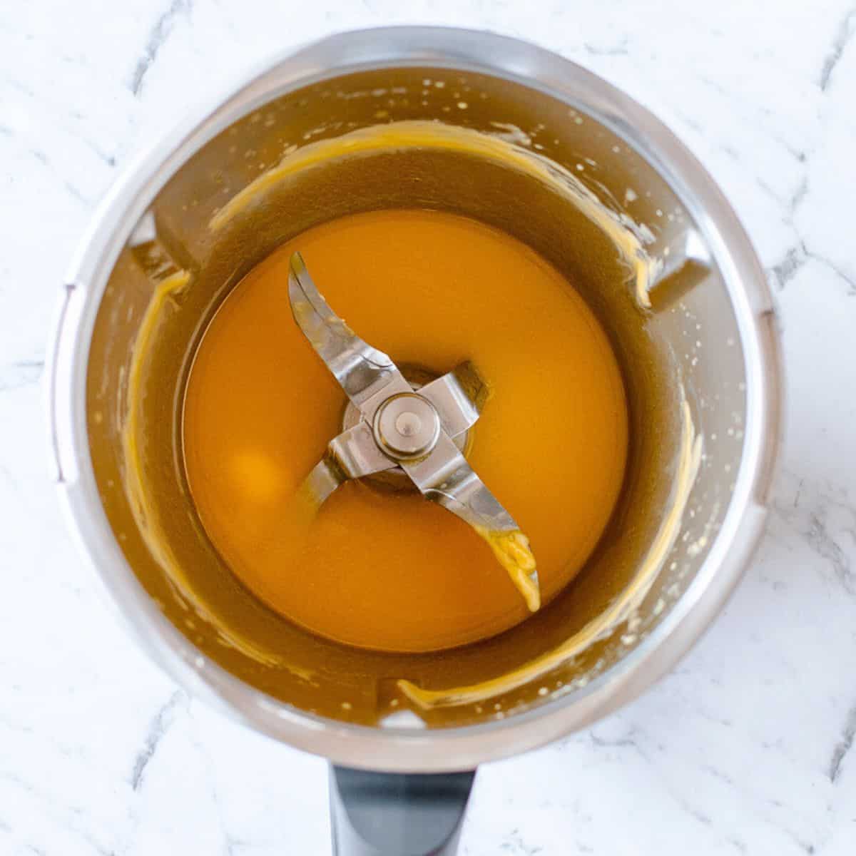 Melted butter in a Thermomix bowl.