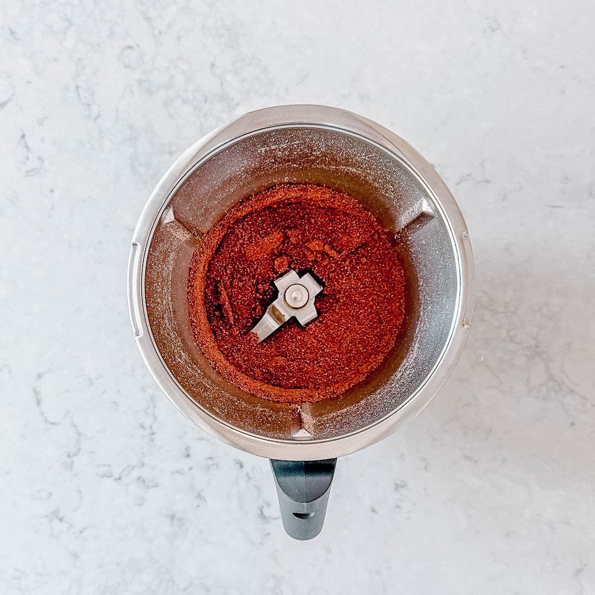 Grated chocolate in a Thermomix bowl