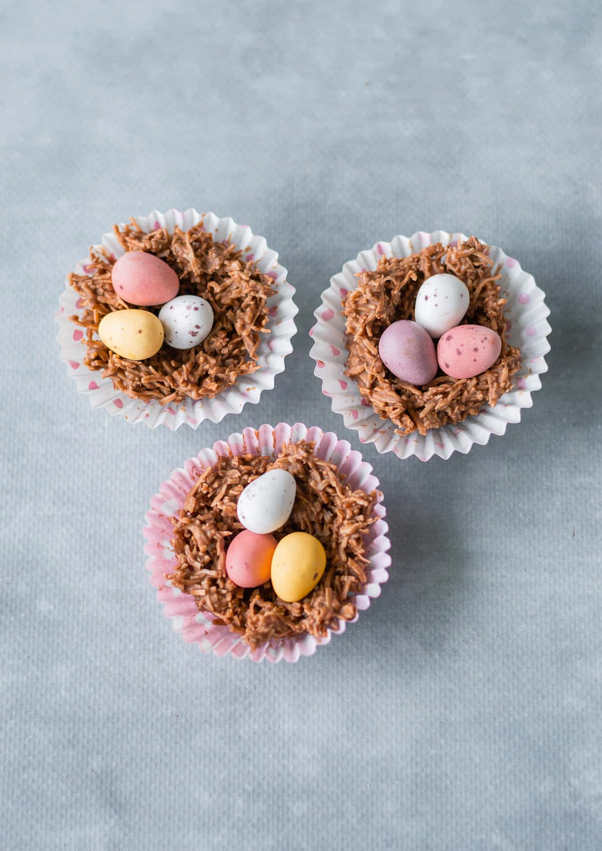 3 chocolate easter egg nests with small easter eggs