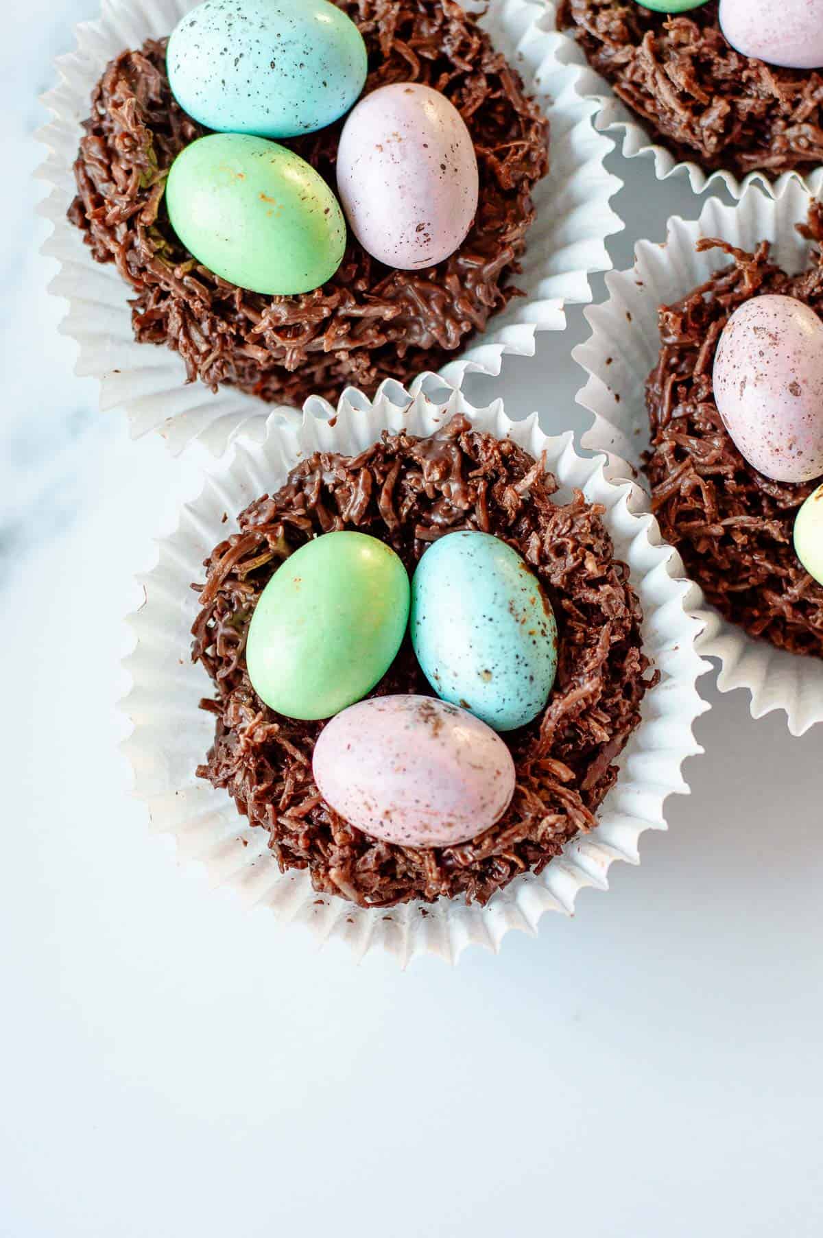 Easter egg nests on a white background.