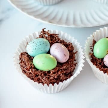 An easter egg nest sitting on an marble benchtop