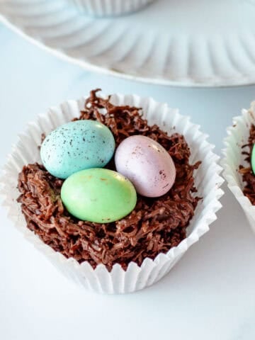 An easter egg nest sitting on an marble benchtop