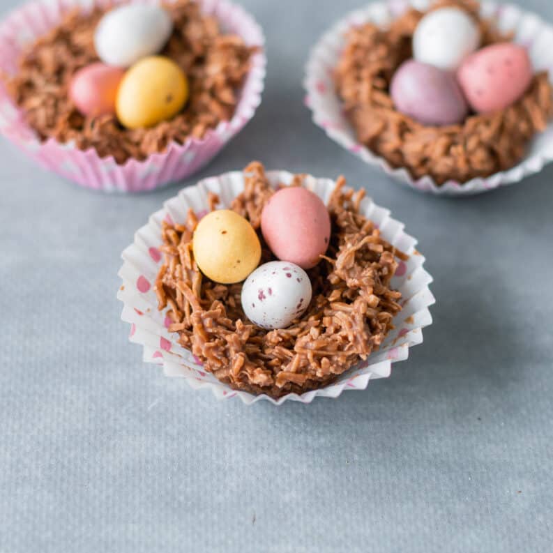 easter egg nests with 3 small easter eggs in each one
