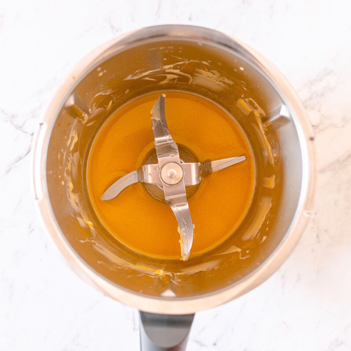 Melted butter in a Thermomix bowl.