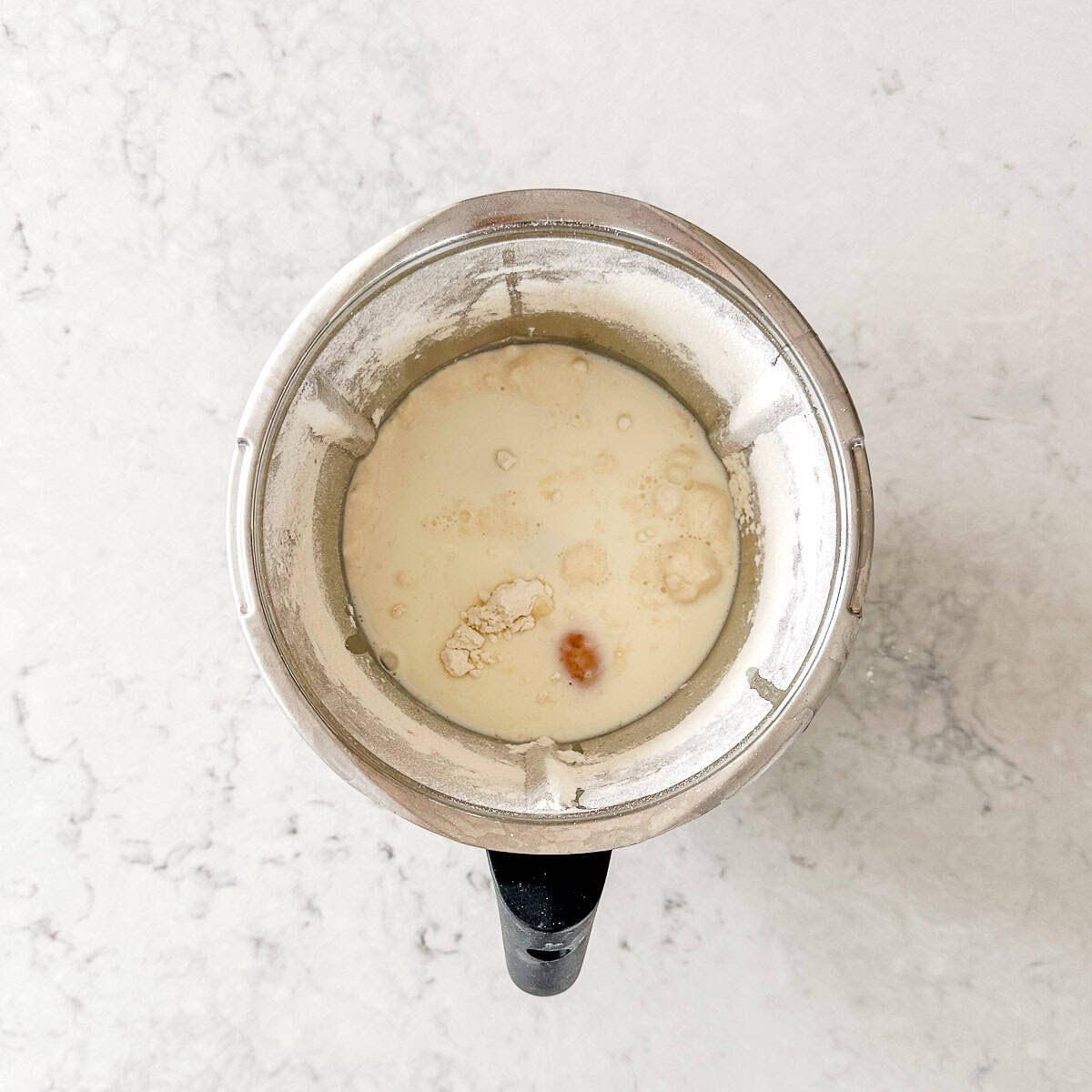 Pancake ingredients in a Thermomix Bowl.