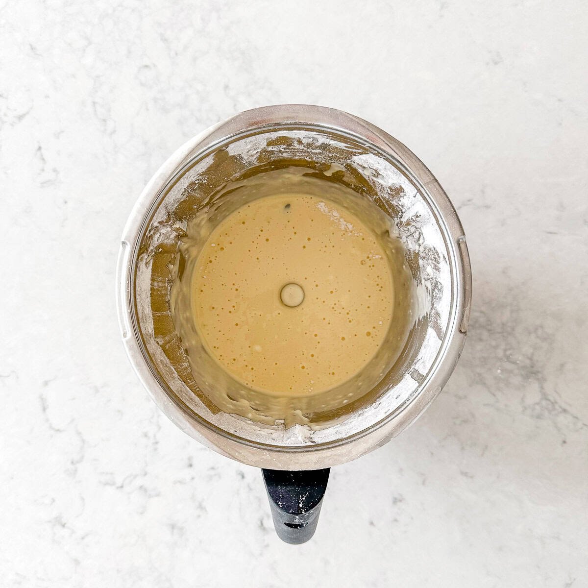 Pancake batter in a Thermomix Bowl.